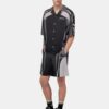 CAMISA DE CAMPAMENTO OVERSIZE CON PANELES DEPORTIVOS
