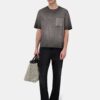 CAMISETA CON BOLSILLO CUADRADO DESBORRADO