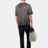 CAMISETA CON BOLSILLO CUADRADO DESBORRADO