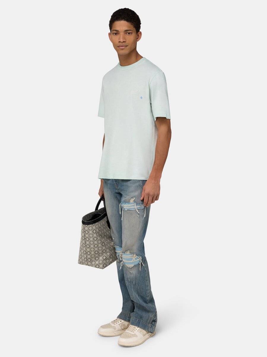 CAMISETA CON ETIQUETA DE CALIDAD Amiri