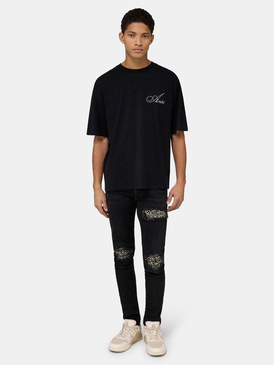 CAMISETA OVERSIZE CON LETRA CRYSTAL AMIRI