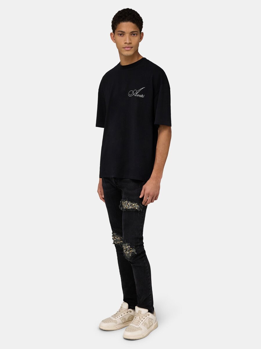 CAMISETA OVERSIZE CON LETRA CRYSTAL AMIRI