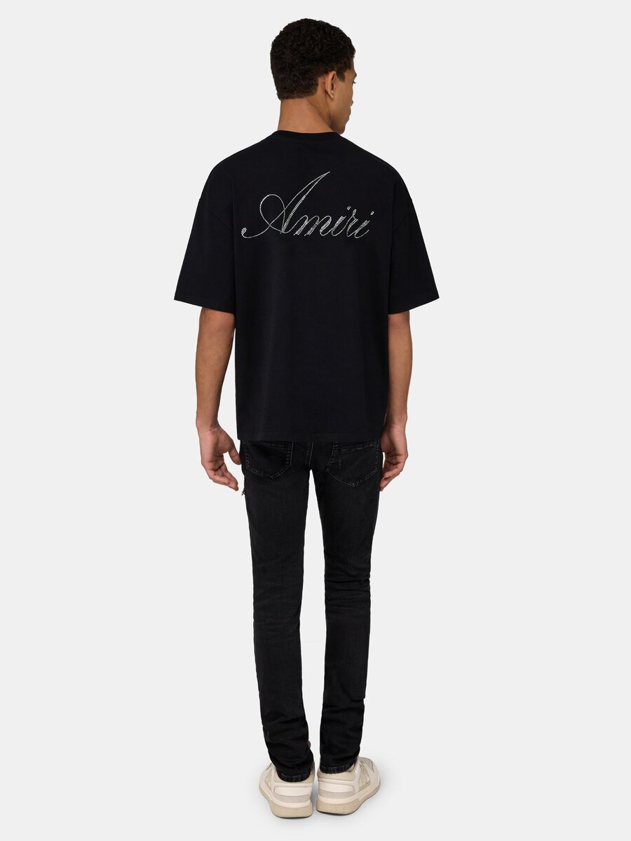 CAMISETA OVERSIZE CON LETRA CRYSTAL AMIRI