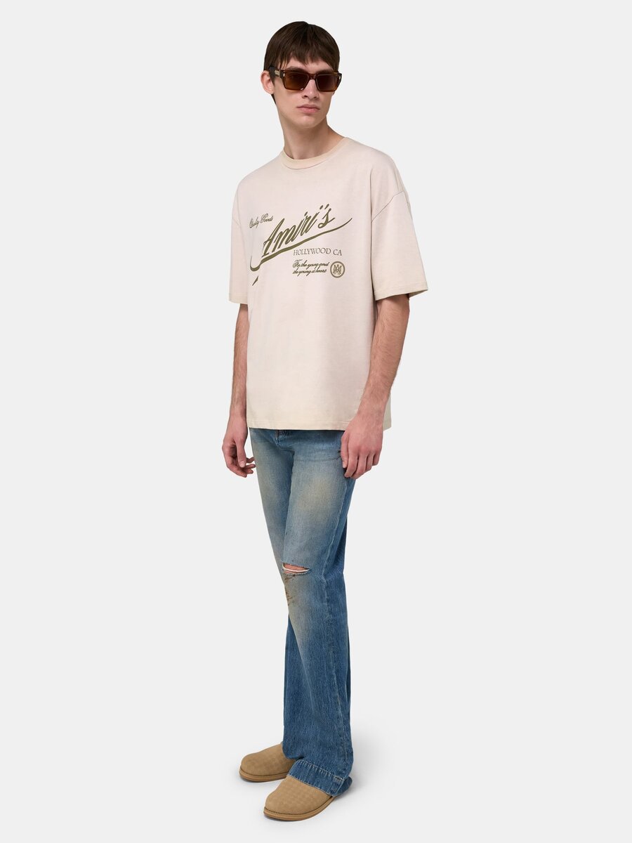 CAMISETA OVERSIZE DE AMIRI QUALITY GOODS