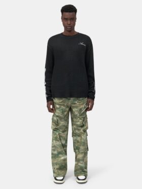 PANTALÓN CARGO DE CAMUFLAJE CON VARIOS BOLSILLOS