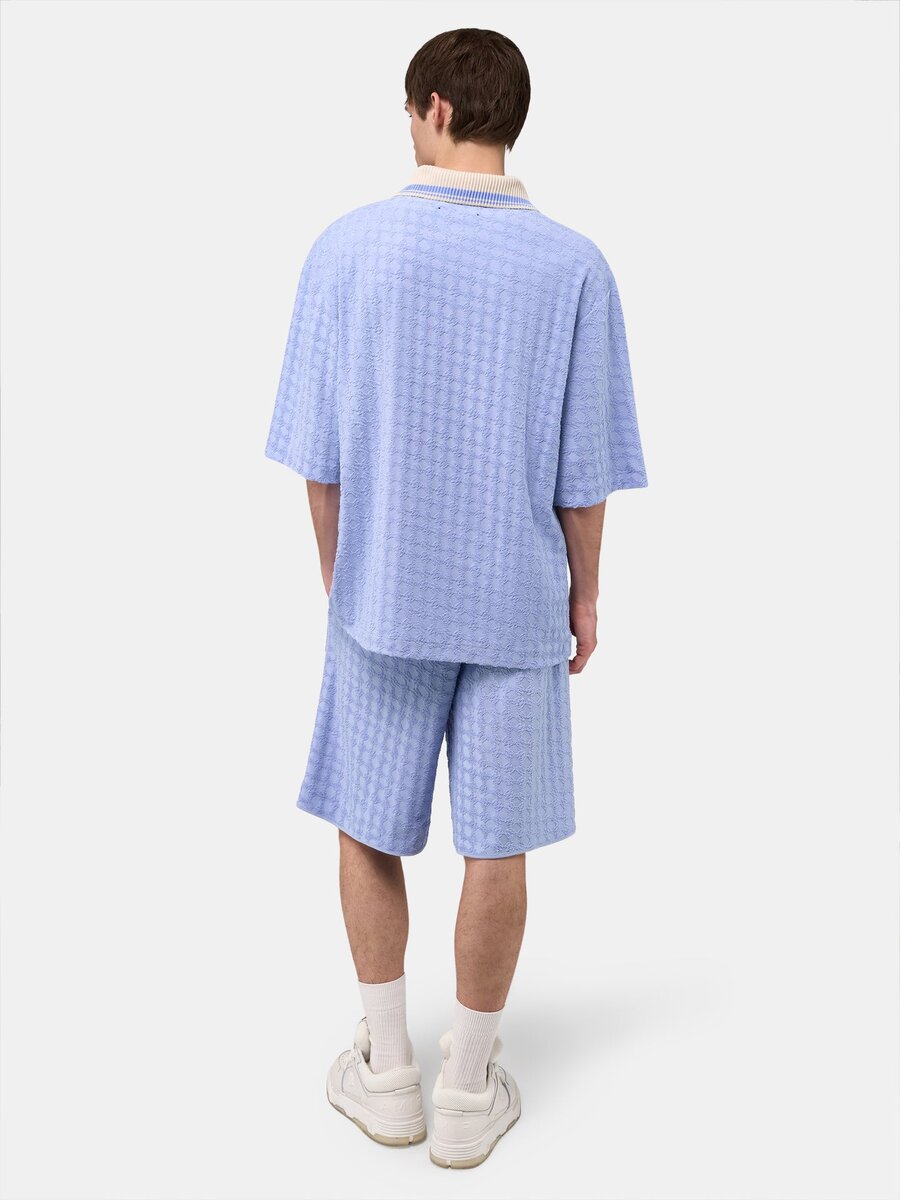 POLO DE TOALLA CON CREMALLERA MA QUAD