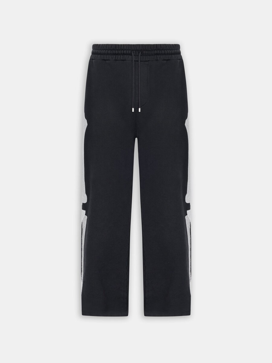 PANTALONES DE CHÁNDAL OVERSIZE CON MOTIVO DE BONES