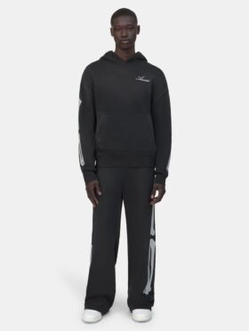 PANTALONES DE CHÁNDAL OVERSIZE CON MOTIVO DE BONES