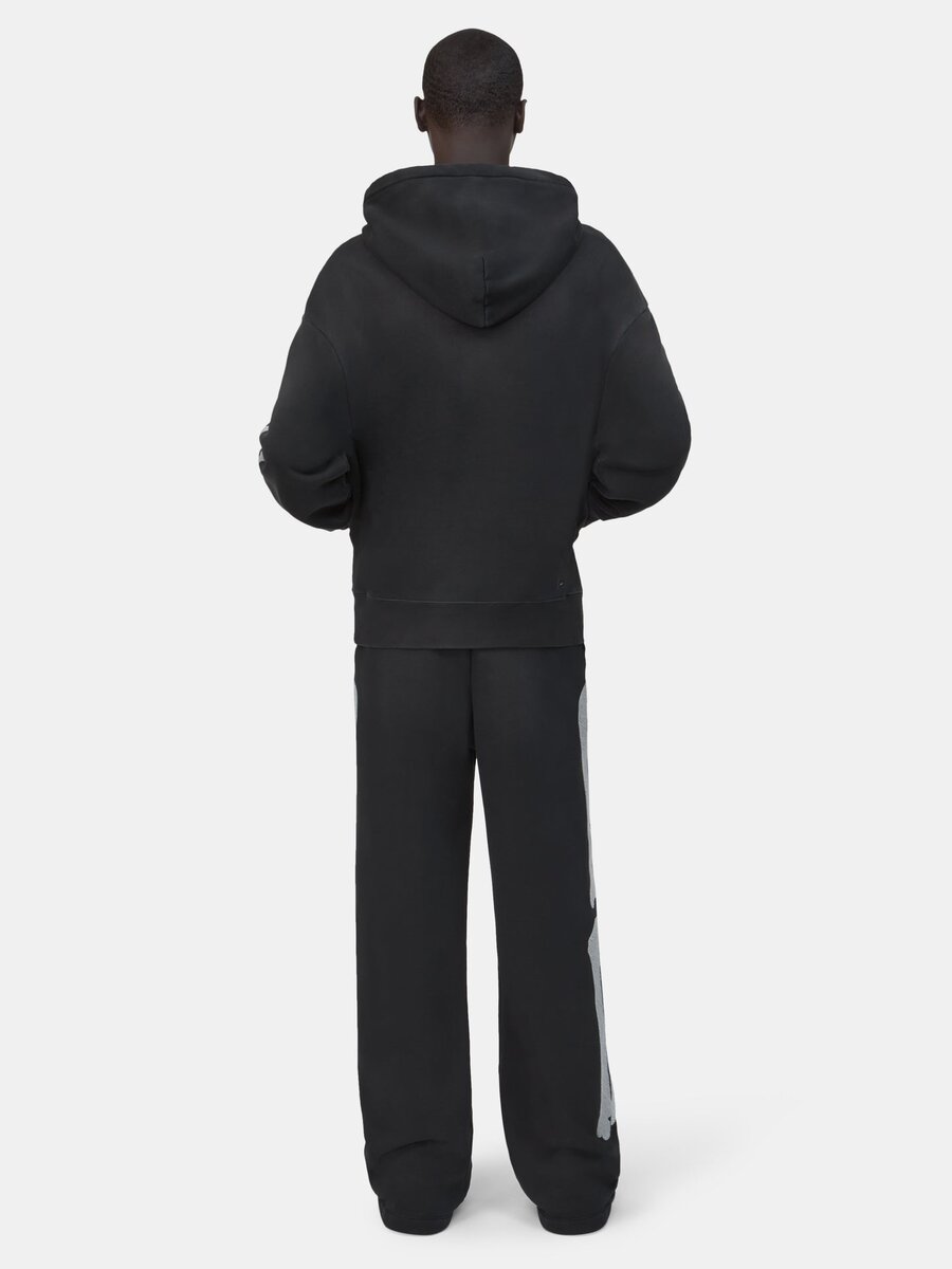 PANTALONES DE CHÁNDAL OVERSIZE CON MOTIVO DE BONES