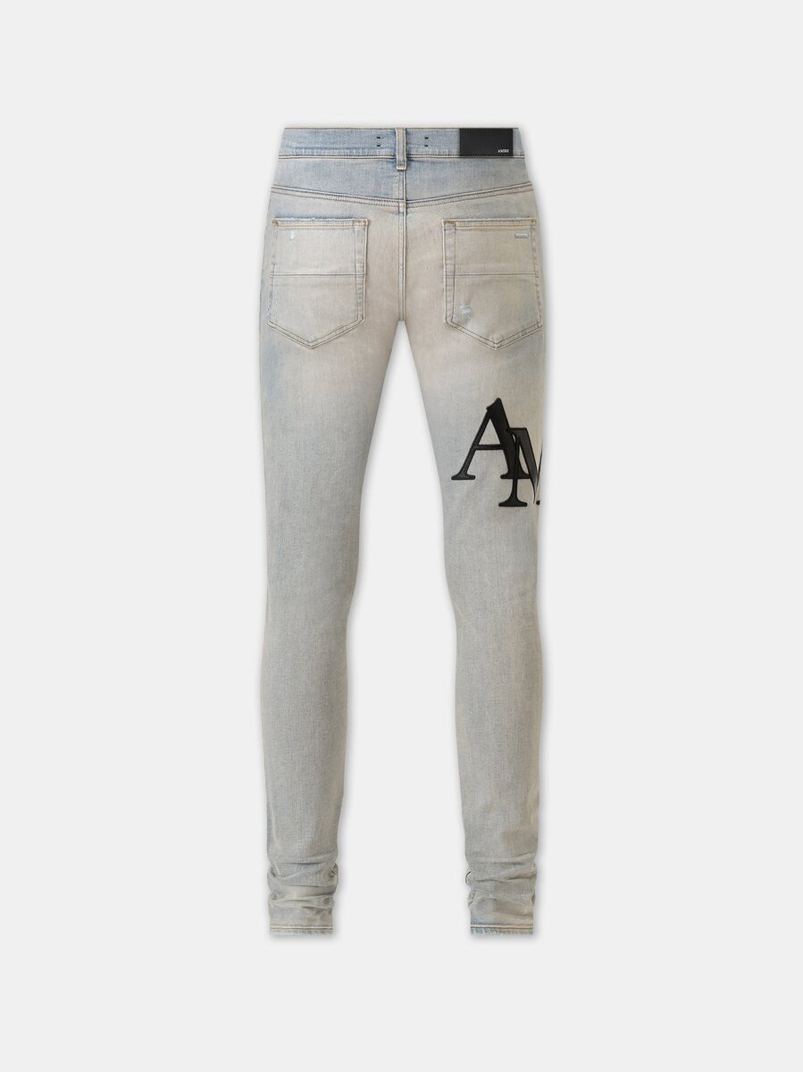 PANTALONES DE JEANS SKINNY CON LOGO DESCALADO