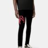 PANTALONES DE JEANS SKINNY CON LOGO DESCALADO - Negro Rojo