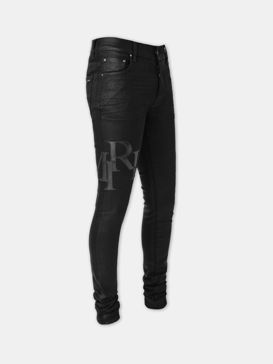 PANTALONES SKINNY DE DENIM CON LOGO DESCALADO ENCERADO
