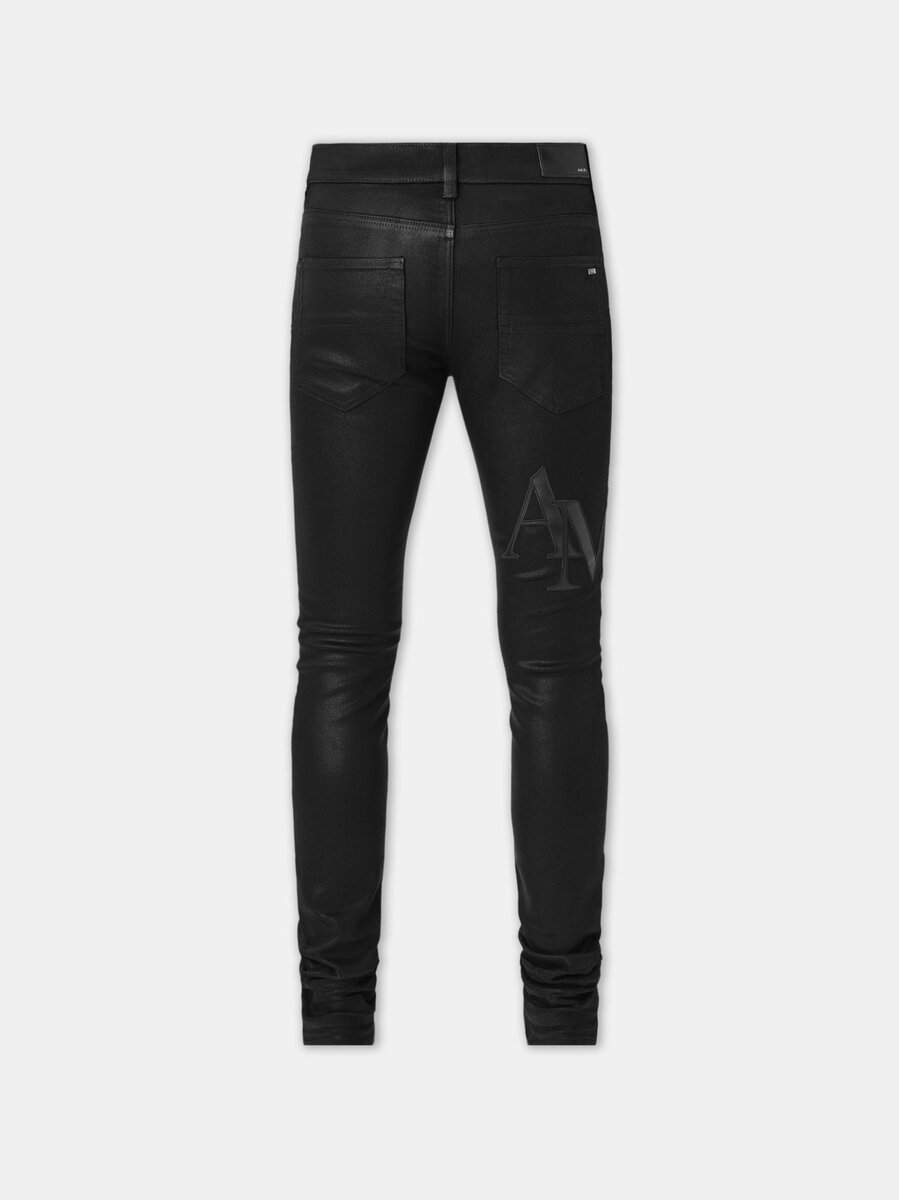 PANTALONES SKINNY DE DENIM CON LOGO DESCALADO ENCERADO