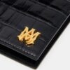 PORTAPASAPORTES CON RELIEVE DE COCODRILO